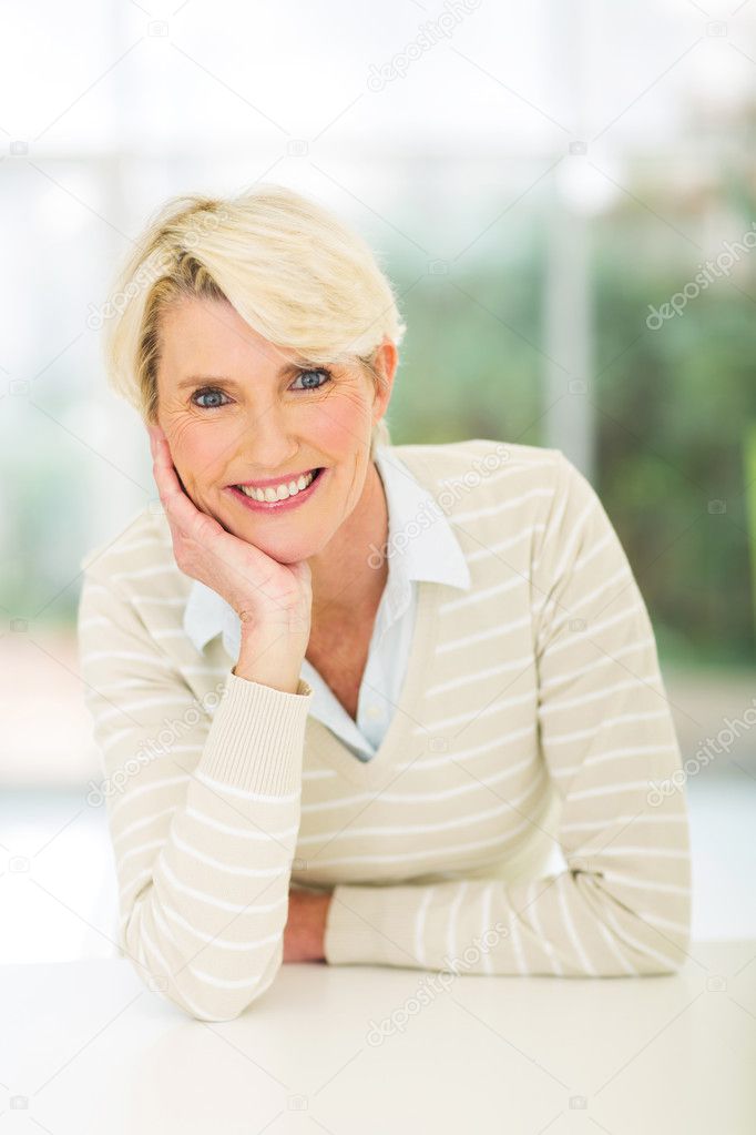 middle aged woman relaxing at home