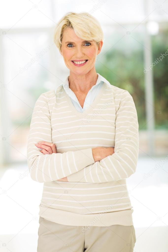 Middle aged woman with arms crossed