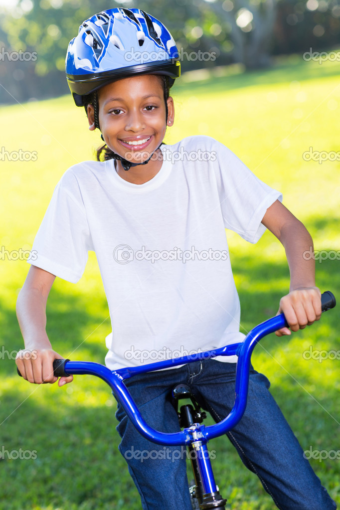 Indian young girl riding bike Stock Photo michaeljung 49178759