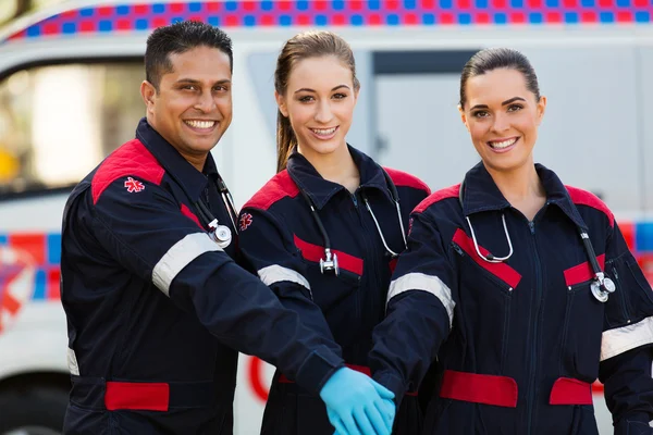 Groep van paramedici handen samen — Stockfoto