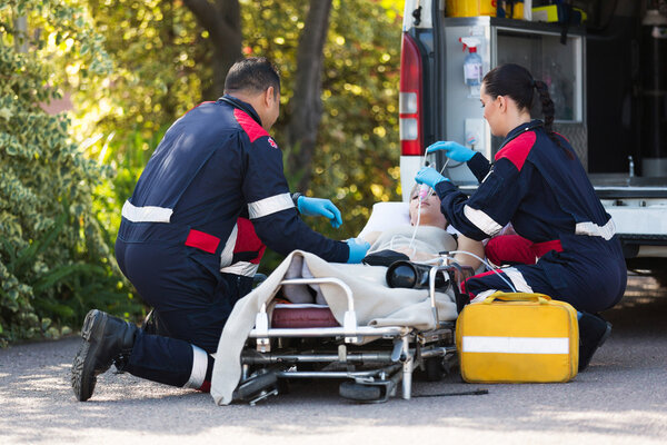 Emergency medical staff rescuing patient