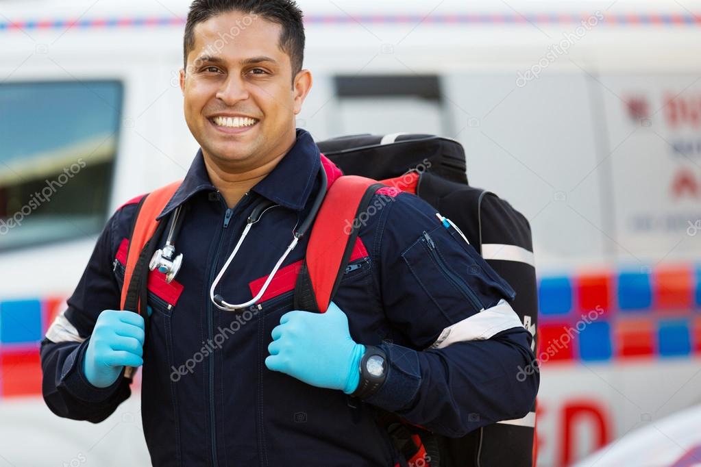 Paramedic carrying portable equipment