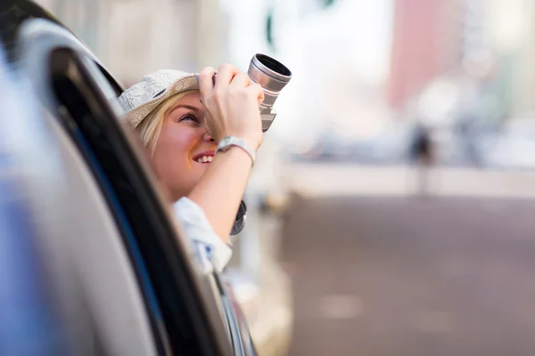 Tourist taking photos with camera — Stock Photo, Image