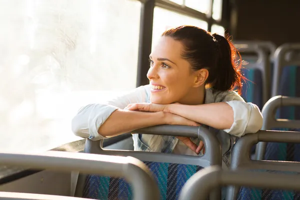 Female commuter daydreaming on bus — Stock Photo, Image