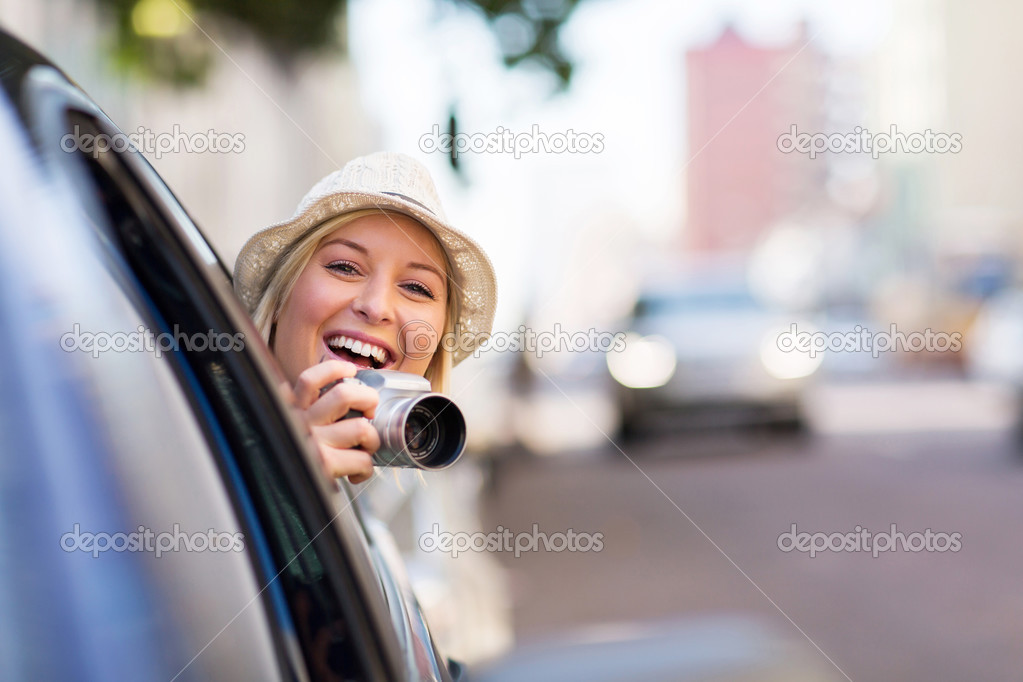 Young woman traveling in car