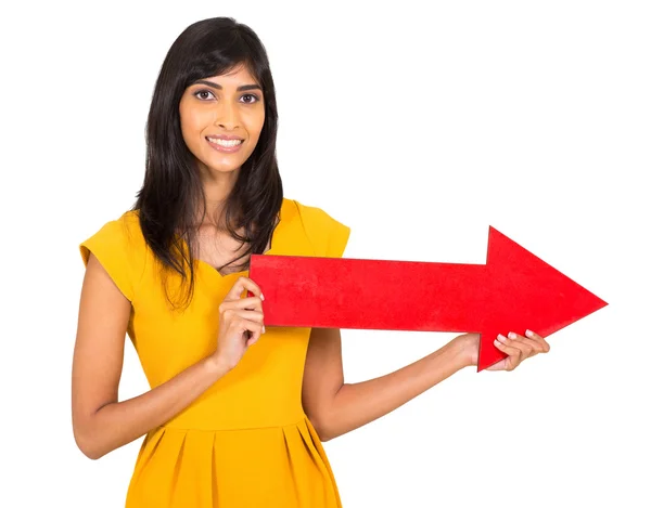 Indian woman holding red direction arrow — Stock Photo, Image