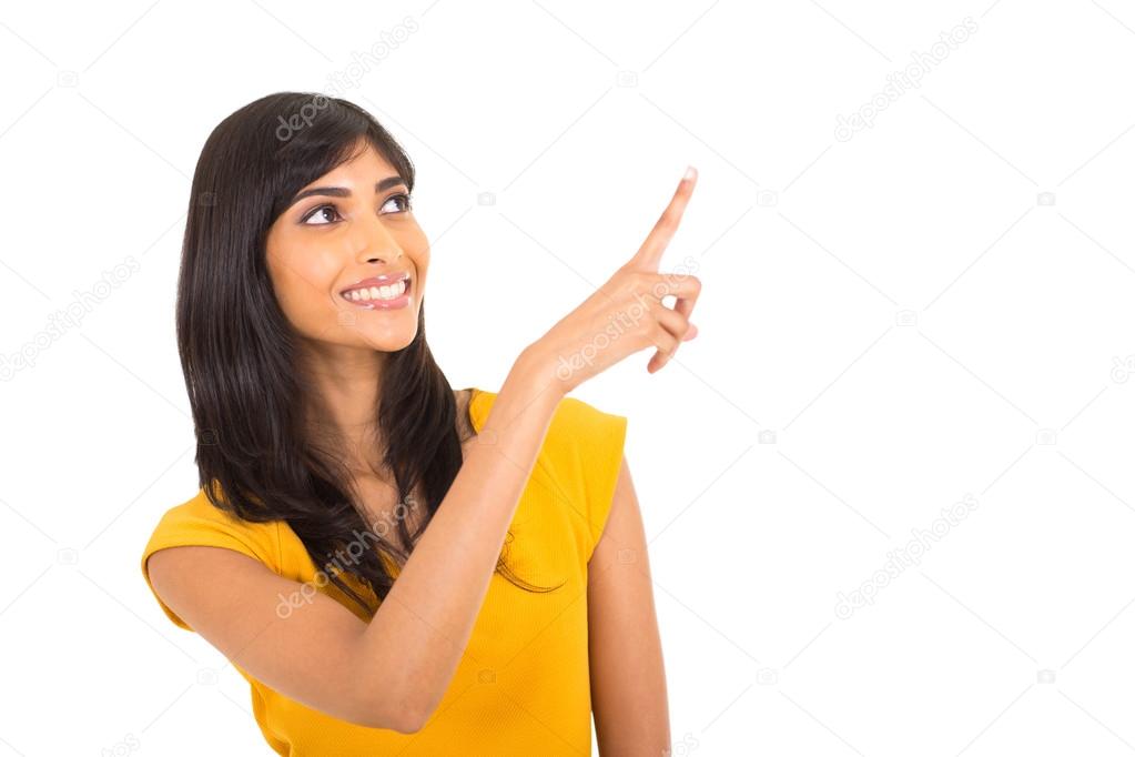 cheerful indian woman pointing up