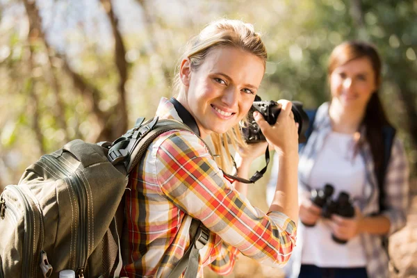 Woman taking photos of her friend — Stock Photo, Image