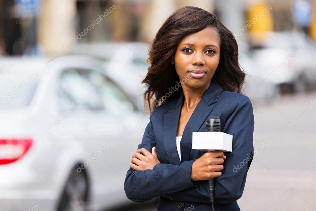 Young african female news reporter