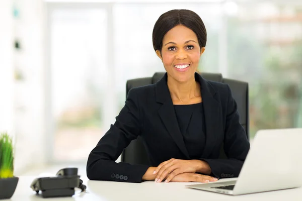 African middle aged businesswoman in office — Stock Photo, Image