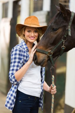 cowgirl with her horse clipart