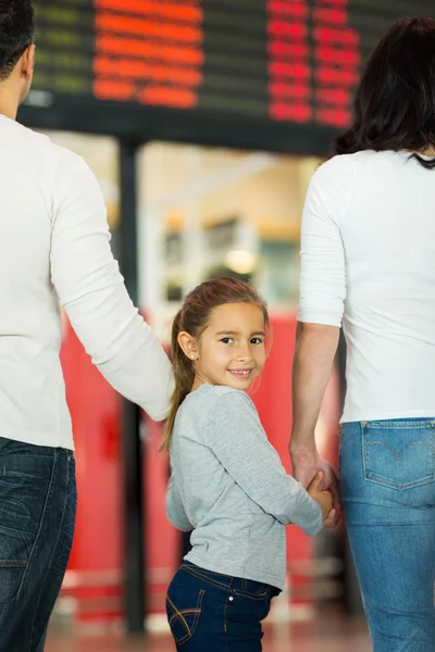 Girl holding parents hands — Stock Photo, Image