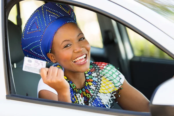 Woman holding driving license — Stock Photo, Image