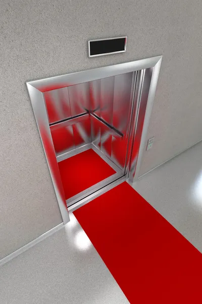 Öppna hiss med röda mattan — Stockfoto