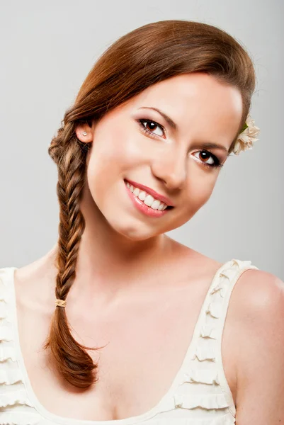 Closeup of young girl smiling — Stock Photo, Image