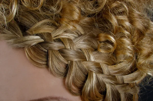 Blonde hair braided in a braid — Stock Photo, Image