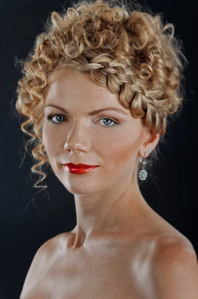 Portrait of beautiful young woman with braid hairdo — Stock Photo, Image