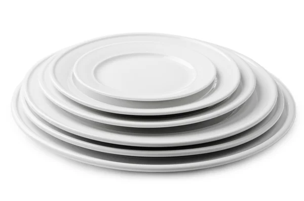 A stack of blank white plates of different sizes — Stock Photo, Image