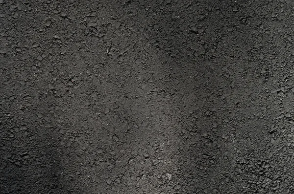 De textuur van zwarte asfalt — Stockfoto