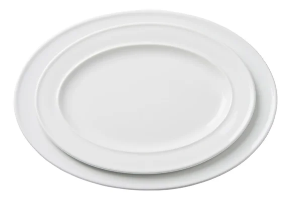 Two empty white oval plate isolated — Stock Photo, Image