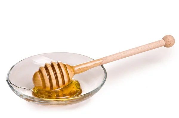 Honing is druipend van de lepel — Stockfoto