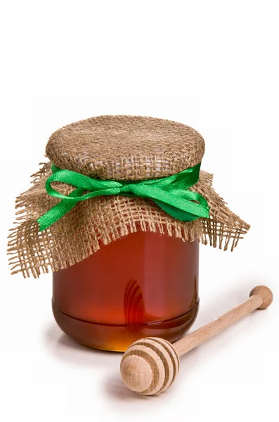 Sweet honey in jar with drizzler — Stock Photo, Image