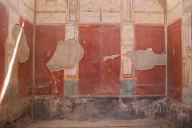 Archaeological park of Pompeii. An ancient city that tragically perished under lava. Old dilapidated houses, villas. Internal Italian courtyards. Walks in the historical places of Europe