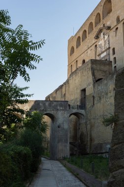 Sant'Elmo Castle is a medieval fortress located on Mount Vomero, adjacent to the Certosa di San Martino, Naples, Italy. The most recent, strong walls of a medieval castle.
