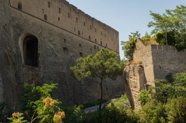 Sant'Elmo Castle is a medieval fortress located on Mount Vomero, adjacent to the Certosa di San Martino, Naples, Italy. The most recent, strong walls of a medieval castle.