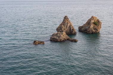 I Due Fratelli ( Two brothers) are a group of rocks located in the municipality of Vietri sul Mare, in the province of Salerno. Calm seascape at sunset