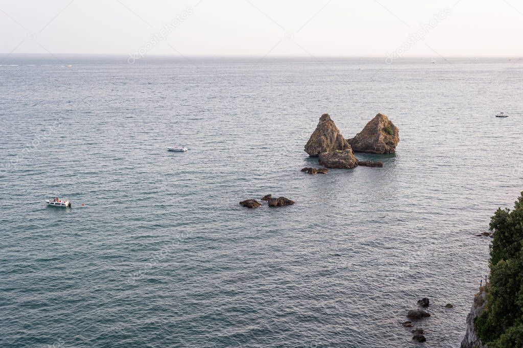 I Due Fratelli ( Two brothers) are a group of rocks located in the municipality of Vietri sul Mare, in the province of Salerno. Calm seascape at sunset