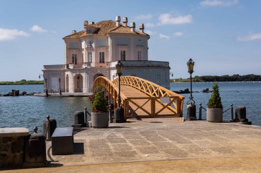 Casina Vanvitelliana. Luxurious Italian villa in the baroque style. House on the water. A hunting lodge located on an islet of Lake Fusaro, in the municipality of Bacoli in the city of Baia.