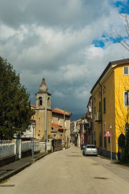 Small old street in the south of Italy. Shabby stone houses. The charm of old Europe, tourism