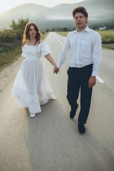 Beautiful wedding couple in nature. Wedding. Bride and groom on their wedding day. High quality photo