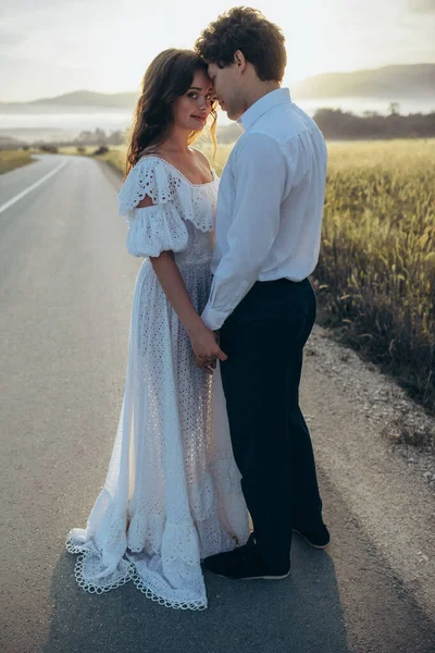 Beautiful wedding couple in nature. Wedding. Bride and groom on their wedding day. High quality photo