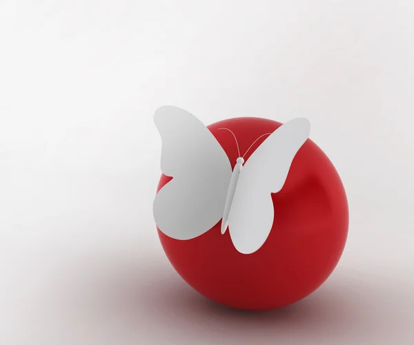 Бабочка на мяче — стоковое фото