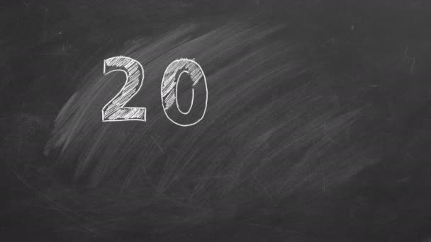 2022 HAPPY ANO NOVO escrito em giz em um quadro negro — Vídeo de Stock
