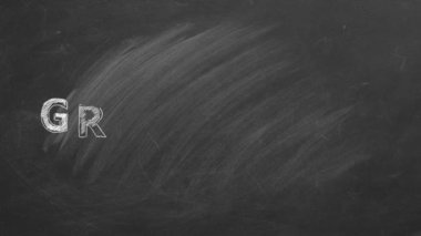 Tahtaya tebeşirle yazılmış 