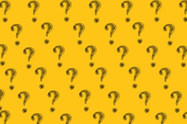 Question marks on yellow background. Ask for help. FAQ concept. Asking questions.