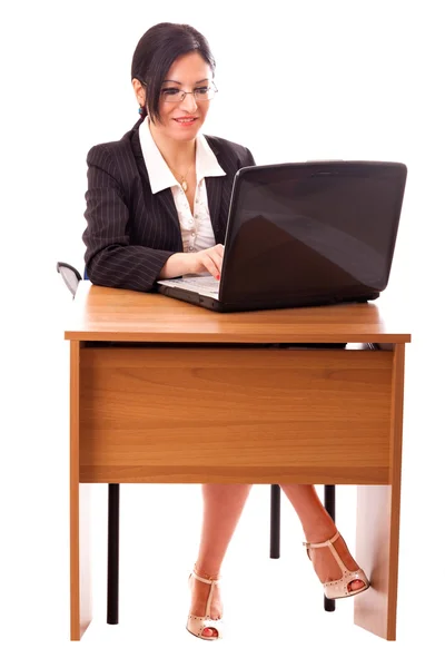 Młody sekretarz przy jej biurku — Zdjęcie stockowe