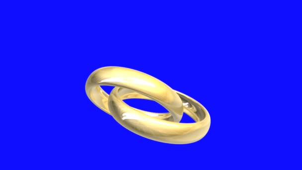 Anillos de boda en oro, pantalla azul — Vídeos de Stock