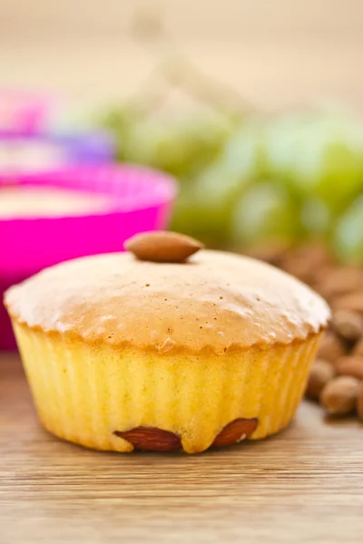 Muffins with almonds and fruit — Stock Photo, Image