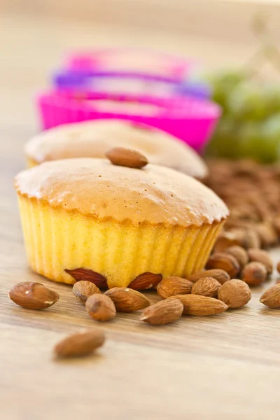 Muffins with almonds and fruit — Stock Photo, Image