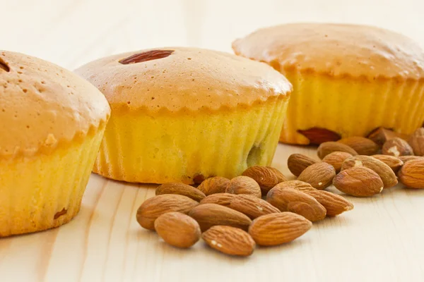 Muffins with almonds and fruit — Stock Photo, Image