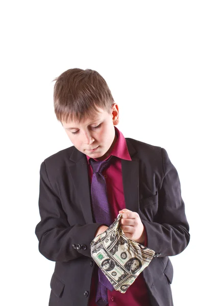 Chico buscando dinero en la bolsa —  Fotos de Stock