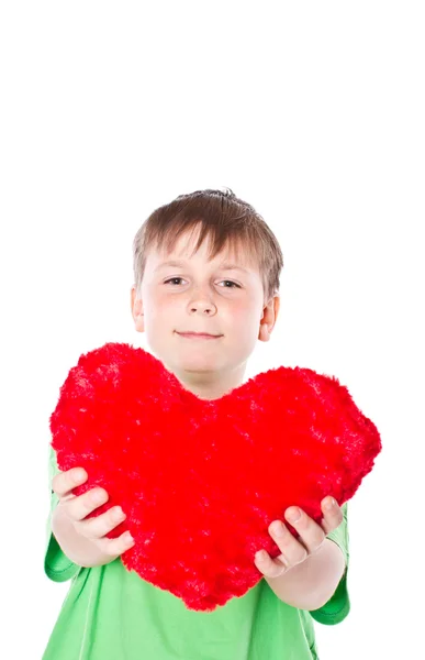 Boy holding a heart Stock Picture