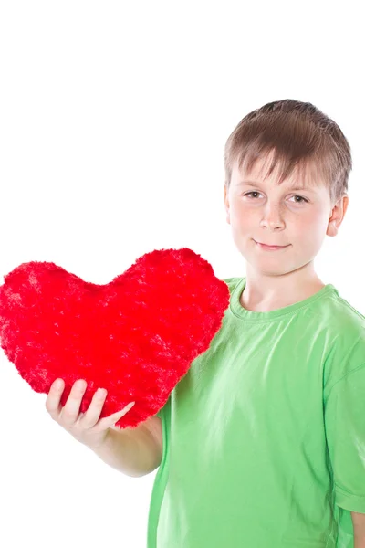 Boy holding a heart Stock Picture