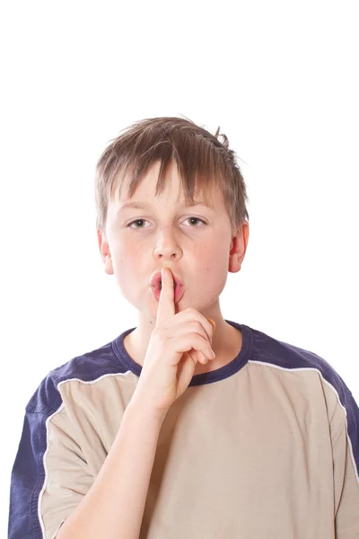 Teen boy visar fingret försiktigt — Stockfoto