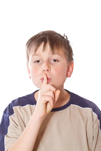 Teen boy shows his finger gently — Stock Photo, Image