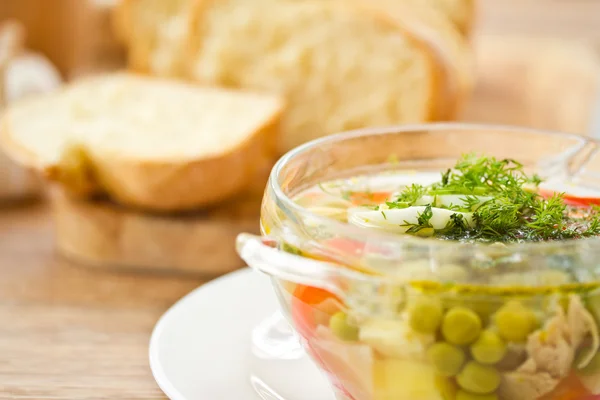 Vegetable soup with green peas — Stock Photo, Image